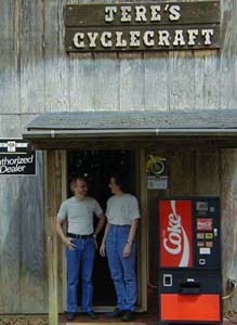 Jere and Pam in the doorway to the motorcycle shop